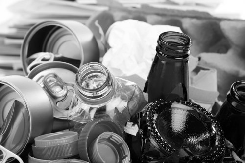 Workers preparing for a house clearance job with protective gear