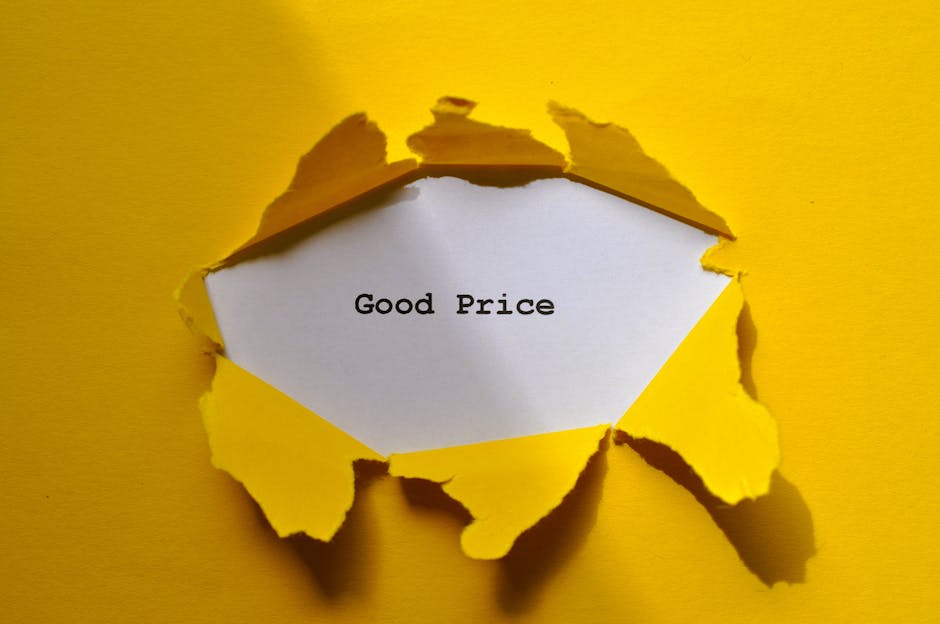 A close-up photograph of five yellow rectangular blocks with black lowercase letters spelling the word 'price' arranged in a slightly curved line on a bright blue background. The blocks have a matte f